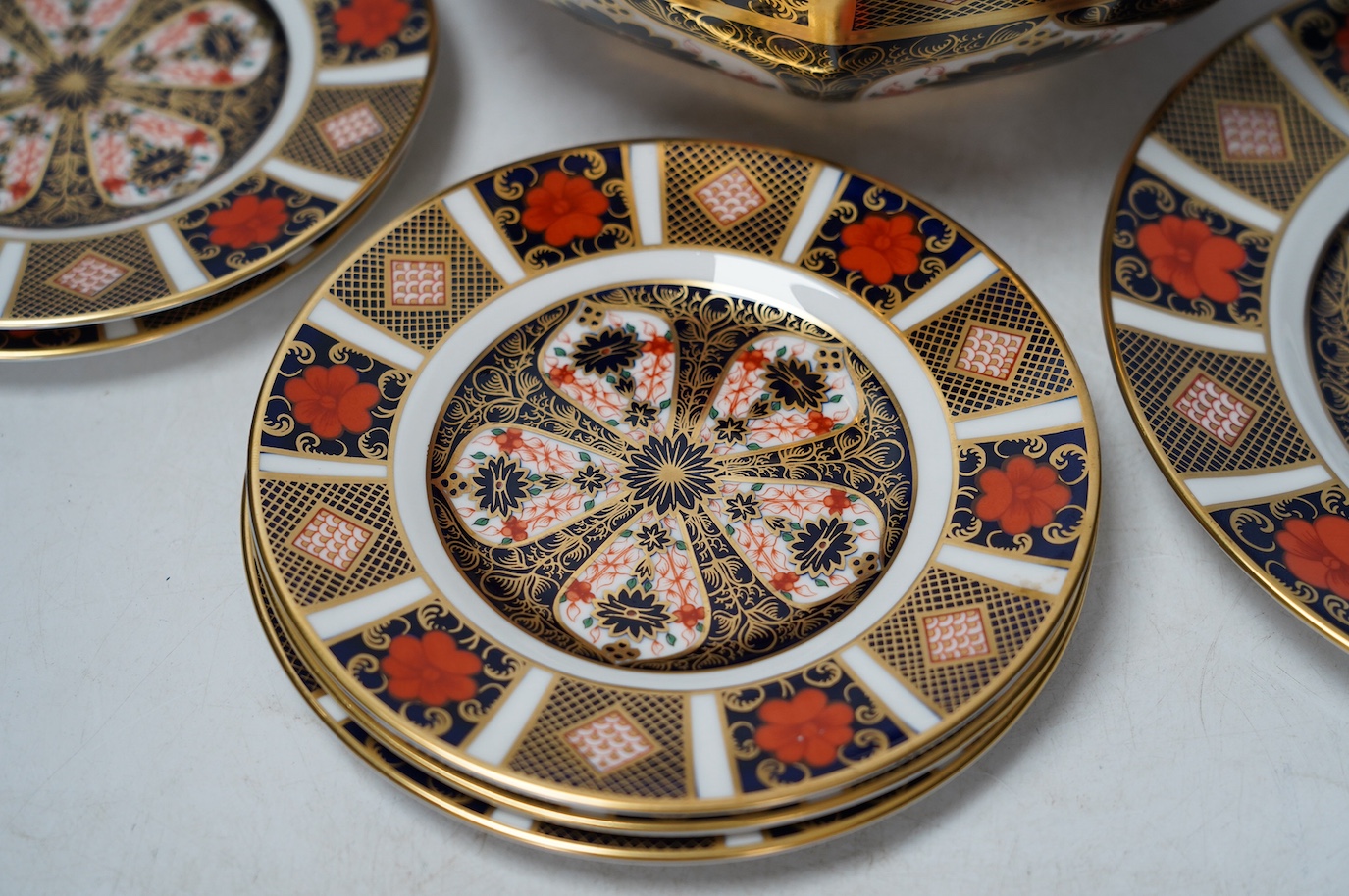 A Royal Crown Derby Imari pattern bowl and six plates, largest 25cm diameter. Condition - good, all factory seconds apart from large dish